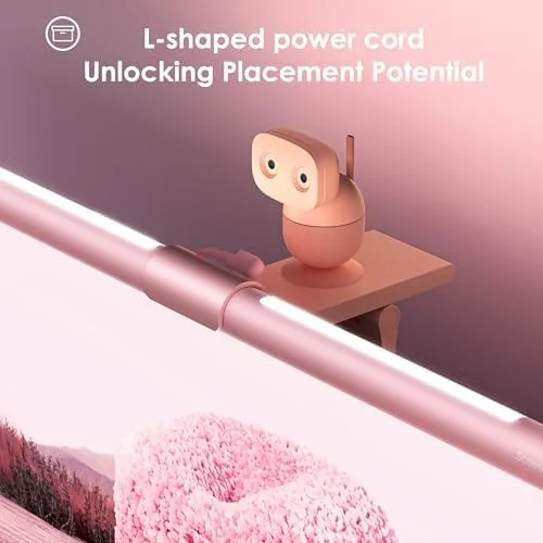 Quntis pink screen light bar illuminating a home office desk setup